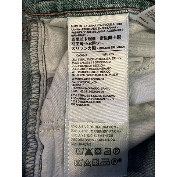 Levis 711 Skinny Jeans Womens 31 Light Wash Distressed Ripped Stretch Denim - Picture 9 of 10